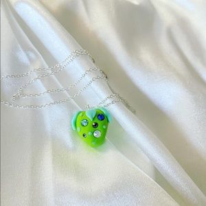 Necklaces with  green strawberry and Swarovski crystal